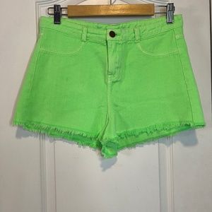green denim shorts